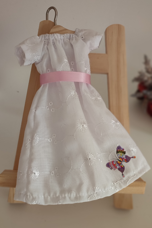 White doll dress with embroidery